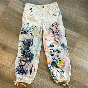 Anthropologie twill cargo pants with graffiti paint size 25